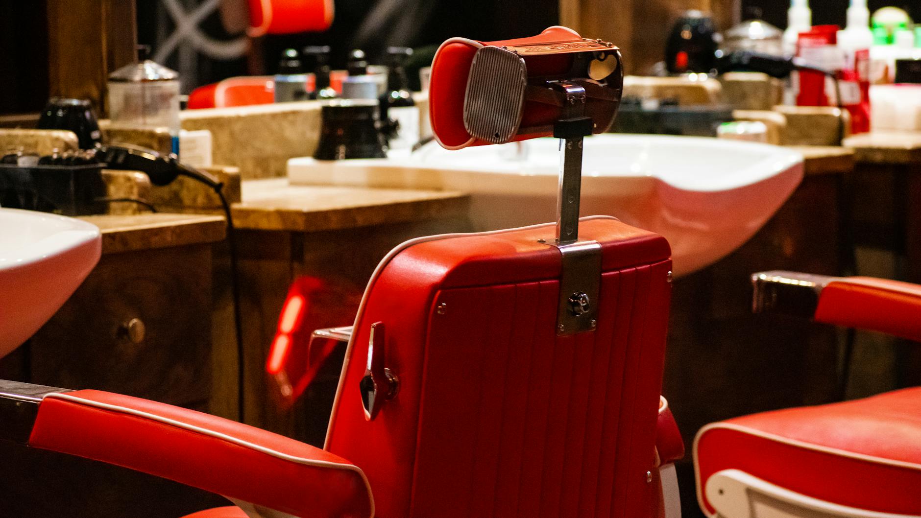Classic barber chair in a warm barbershop setting